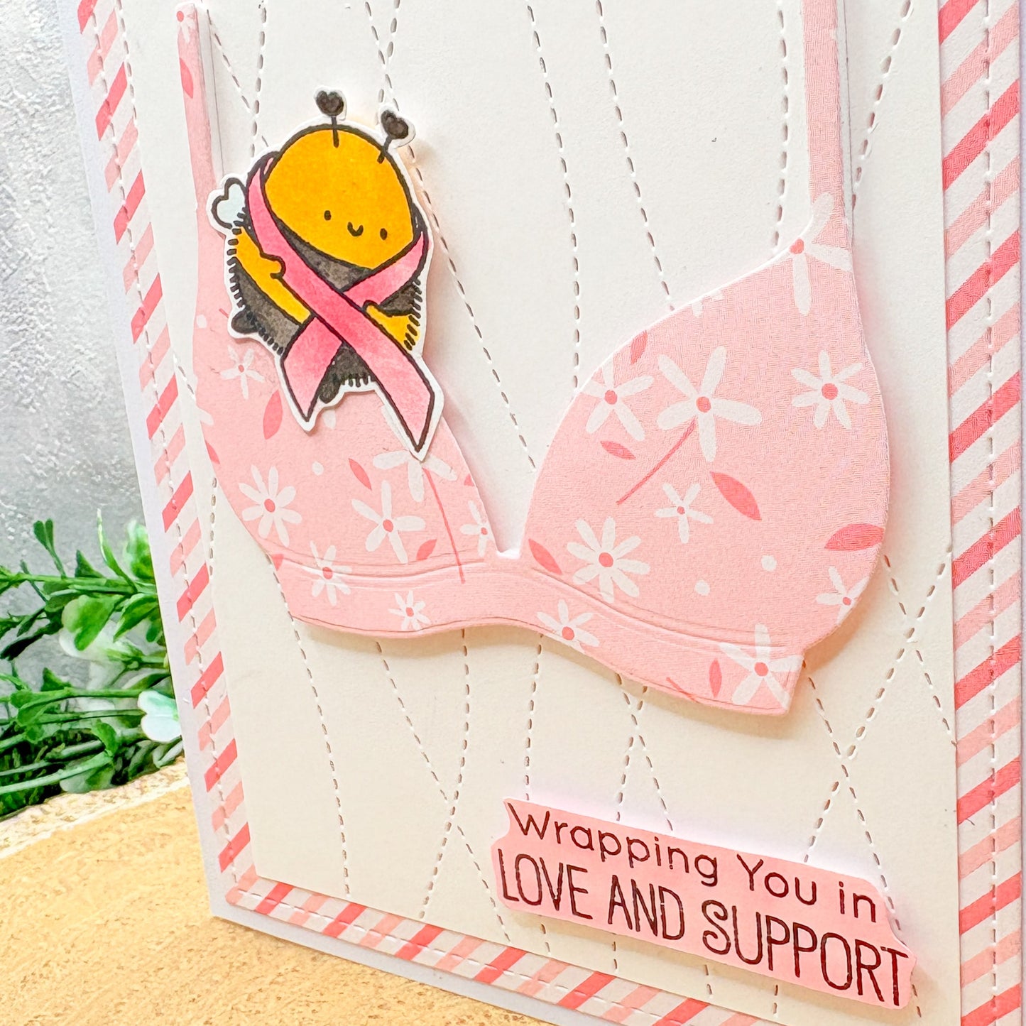 Card with a pink bra design and a cartoon bee wearing a pink ribbon, on a white background. Breast Cancer Awareness Bee & Bra Handmade Support Card