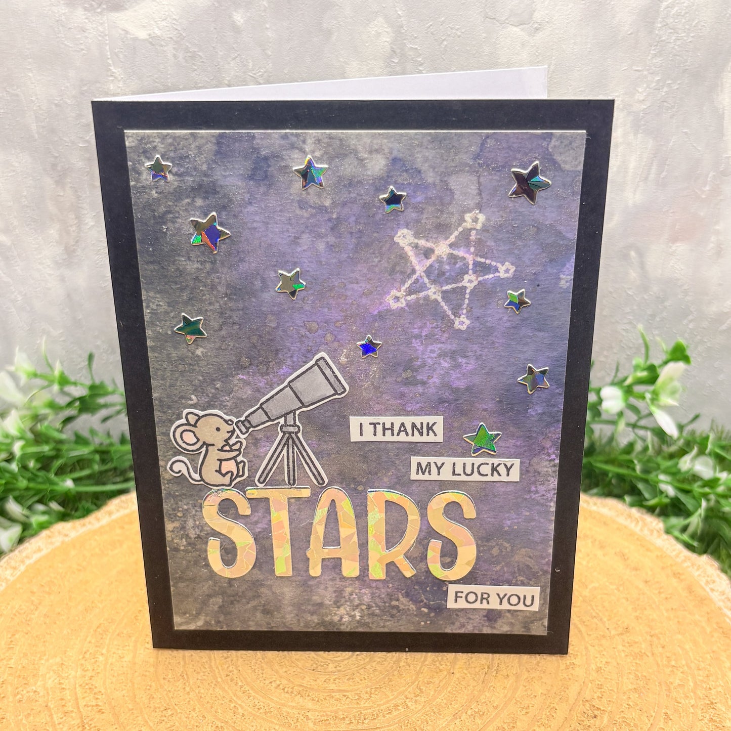Handmade Thank You Card with a mouse, telescope, and 'I thank my lucky stars for you' text on a starry background.