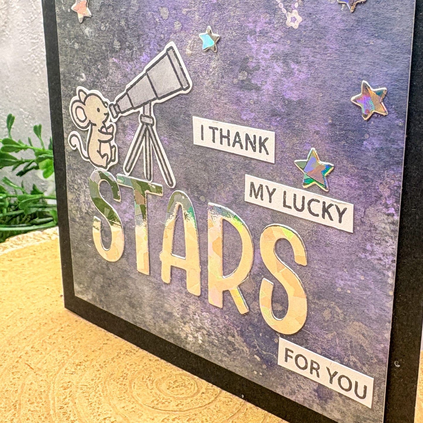 Handmade Thank You Card with a mouse, telescope, and 'I thank my lucky stars for you' text on a starry background.