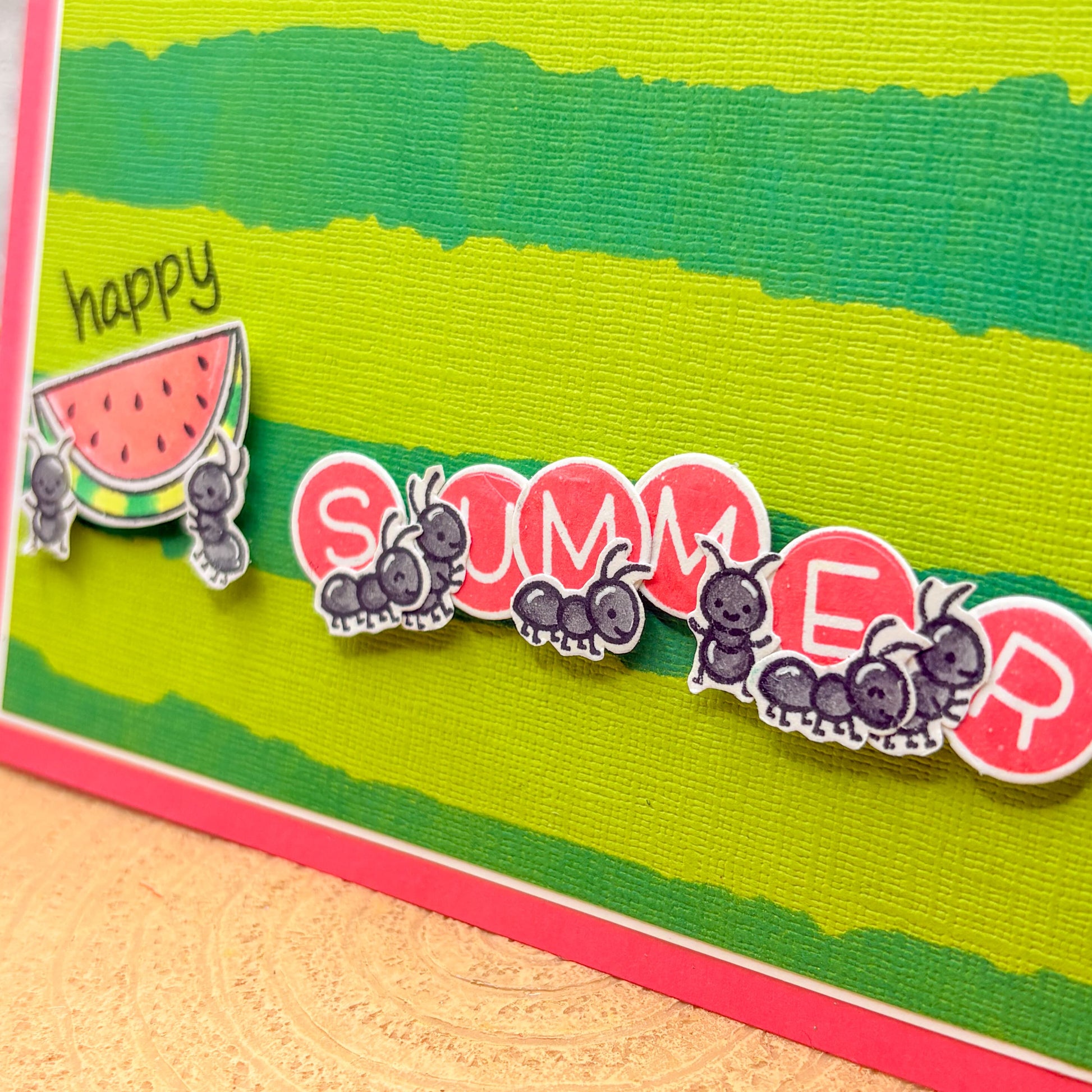 Card with 'Happy Summer' text and watermelon design on a green background