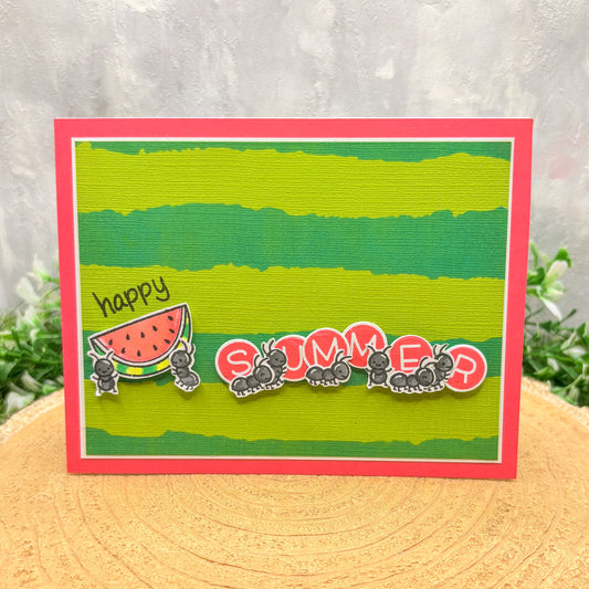 Handmade card with 'Happy Summer' text and watermelon design on a green background.