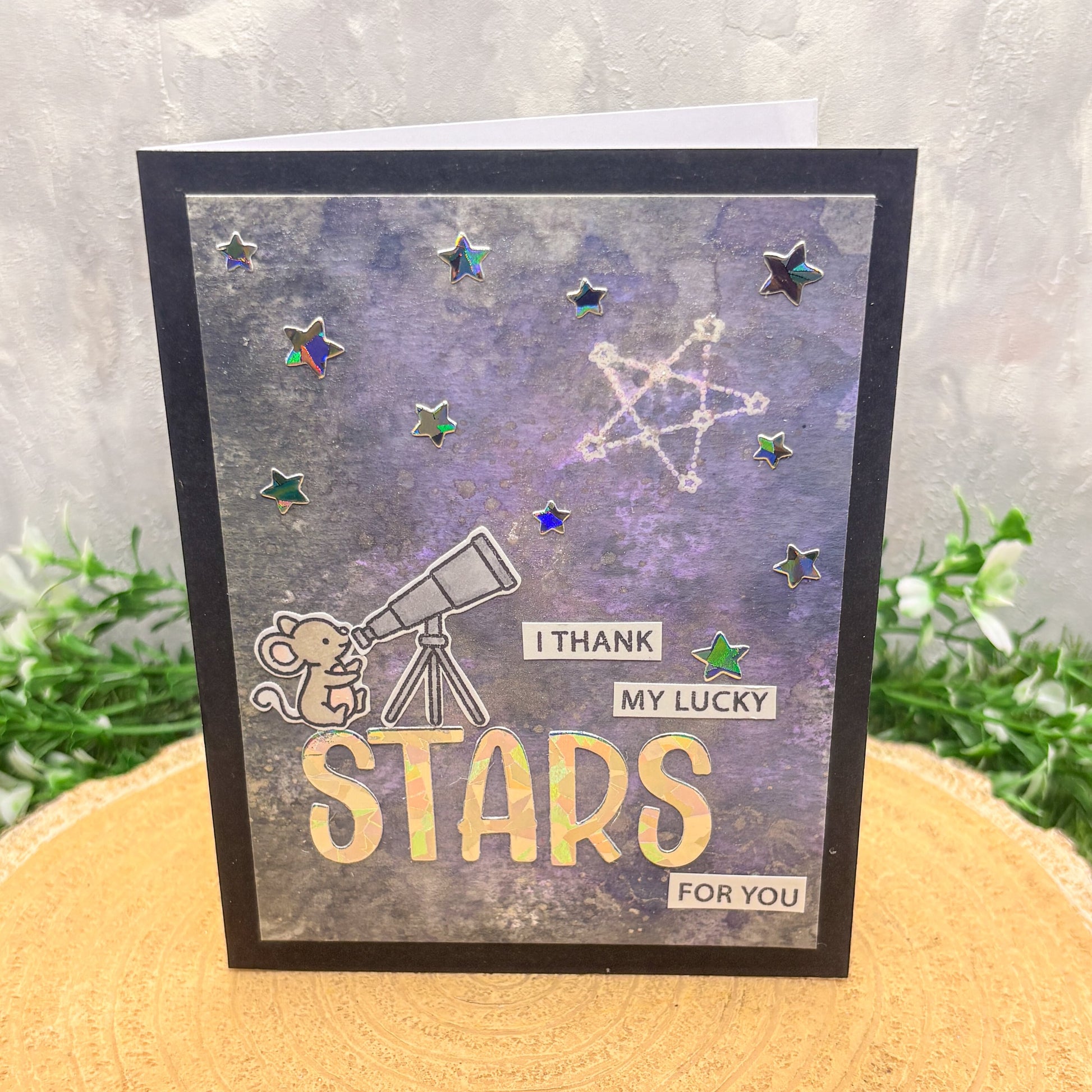 Handmade Thank You Card with a mouse, telescope, and 'I thank my lucky stars for you' text on a starry background.